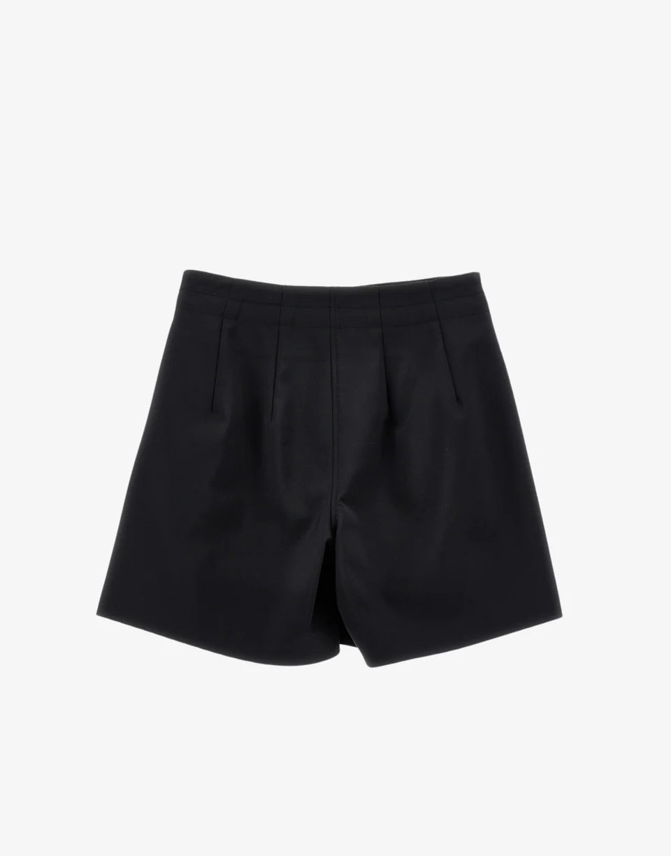 short con tasche e fusciacca a fiocco